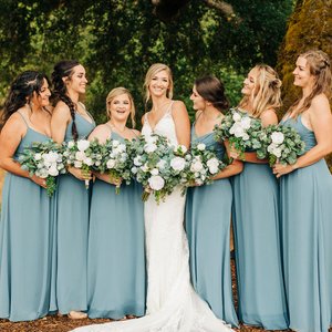 Dusty blue bridesmatids dresses surrounded by nature at this wedding is perfection! Mountain House Estate weddings are lovely
